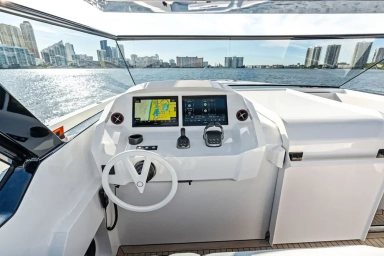 Helm of an express cruiser during a boat sea trial checklist run in Biscayne Bay