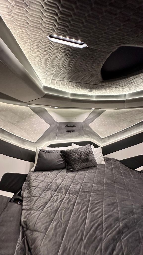 Cabin interior on a production dayboat, where the furniture modules are structural and the layout locks early in the new boat build process