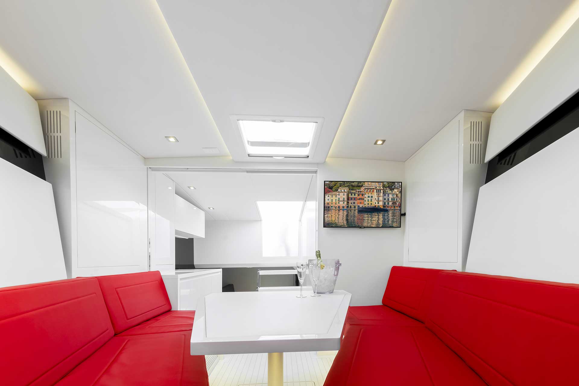 The cabin of a VanDutch 48, laid out with seating rather than berths.